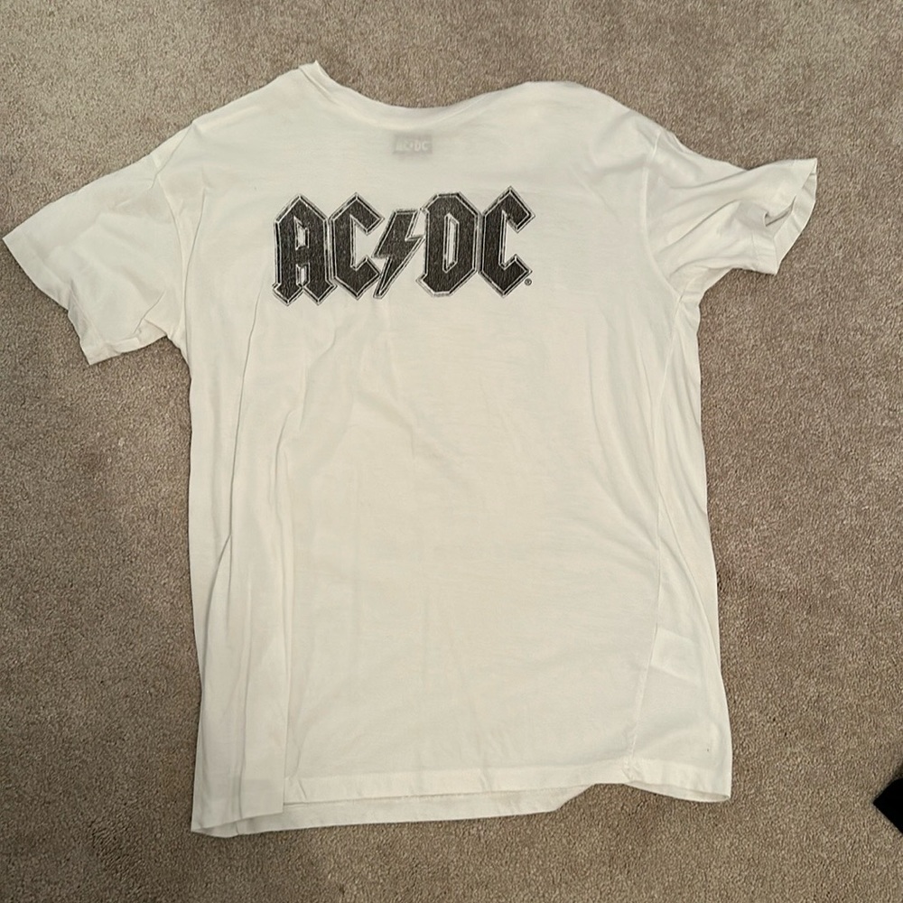 White AC/DC tshirt.